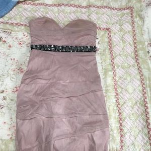 A stunning champagne form fitted dress